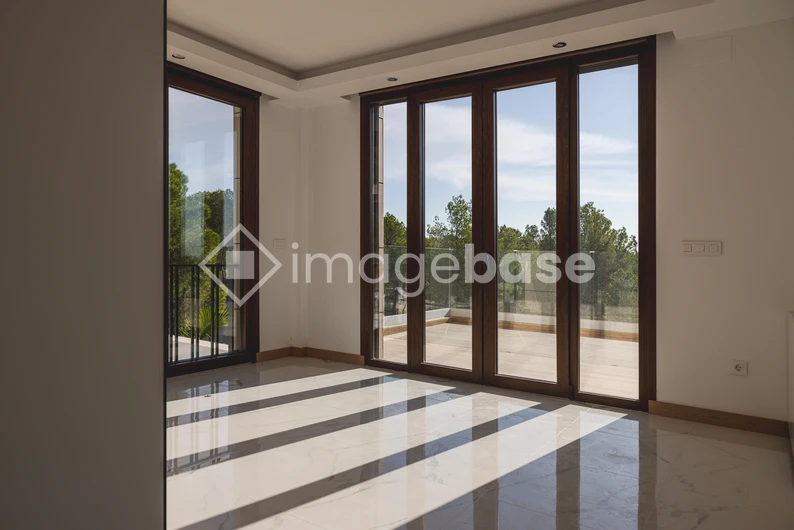 Sunlit Room with Large Windows