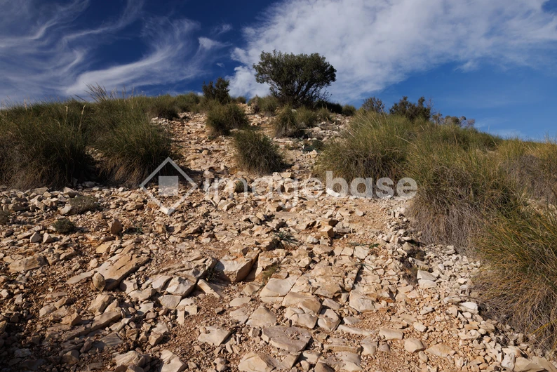 Rugged Landscape Under Blue Sky