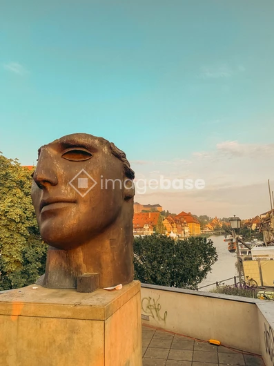 Urban Sculpture Overlooking a Canal