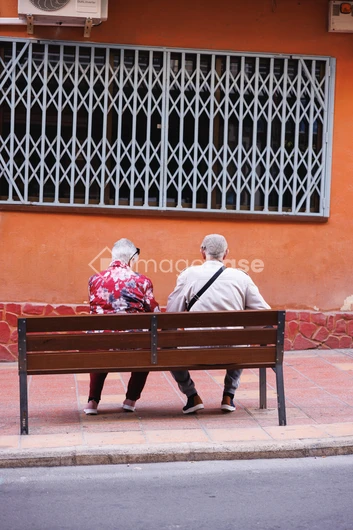 Elderly Couple on a Bench