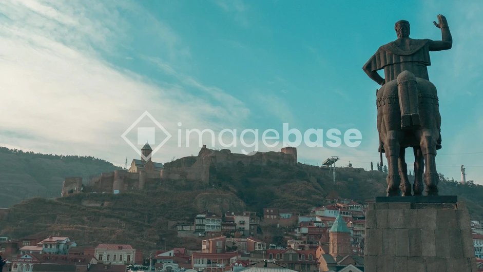Historic City Skyline with Statue