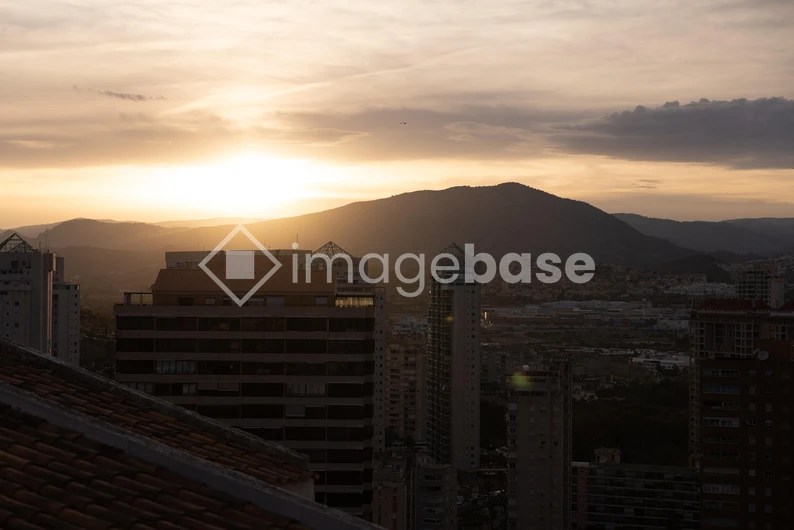 Sunset Over Urban Skyline