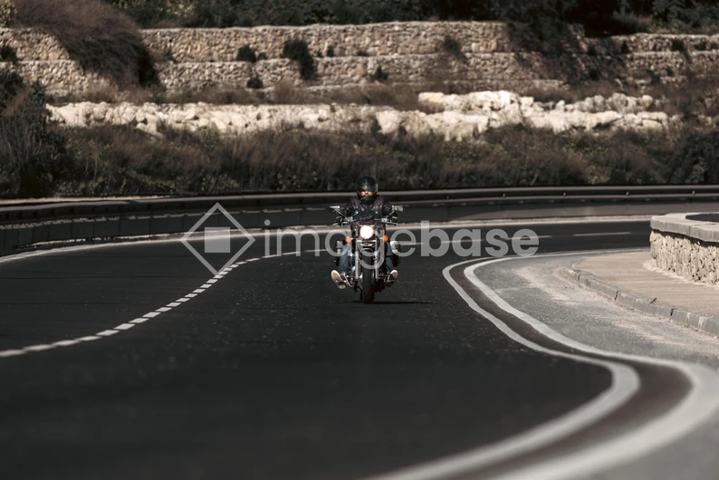 Motorcyclist on Scenic Road
