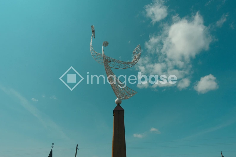 Modern Sculpture Against Blue Sky
