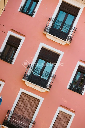 Balconies on Pink Wall