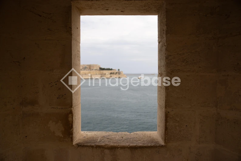 Seaside View Through Stone Window