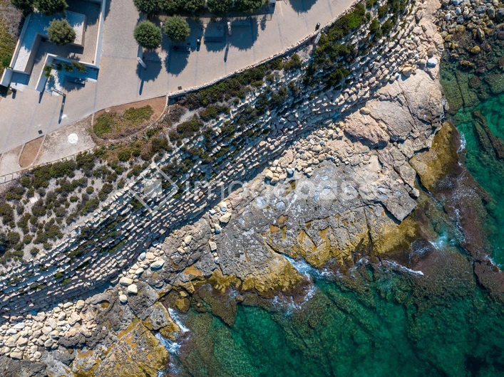 Coastal Cliff and Turquoise Waters