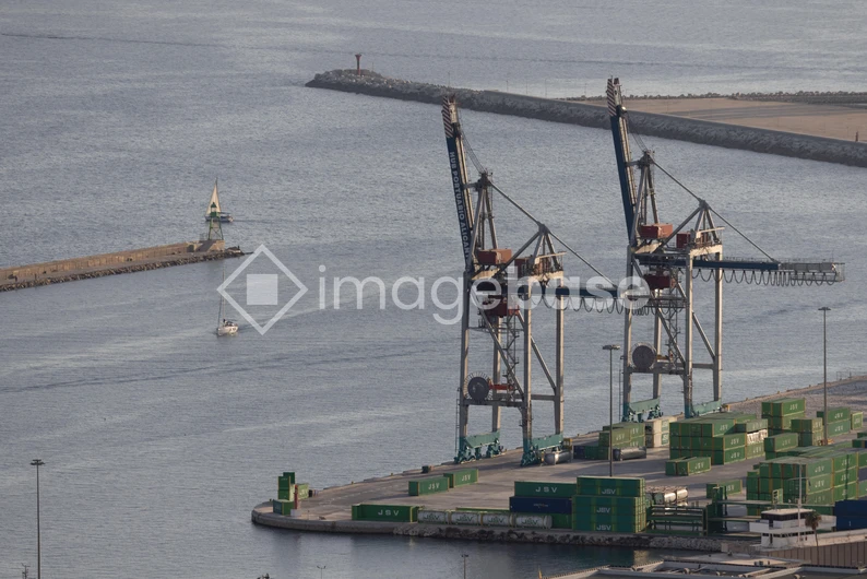 Port with Cranes and Shipping Containers