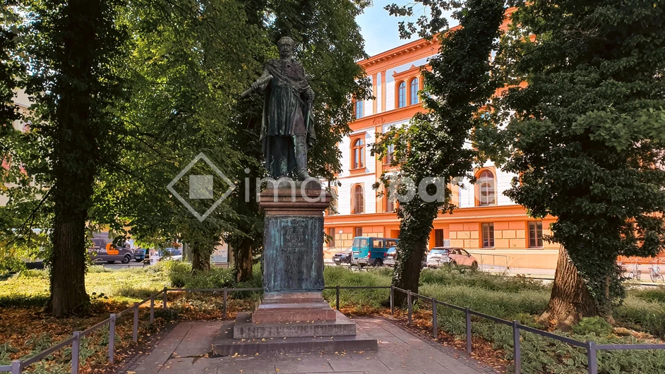 Historic Statue Amidst Urban Nature
