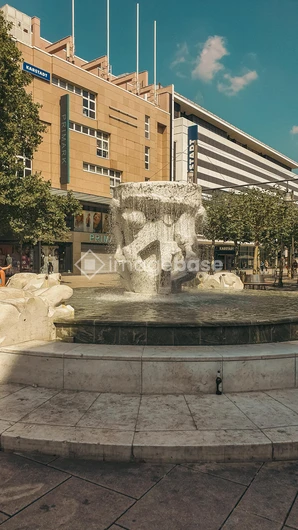 Urban Fountain in Sunlight
