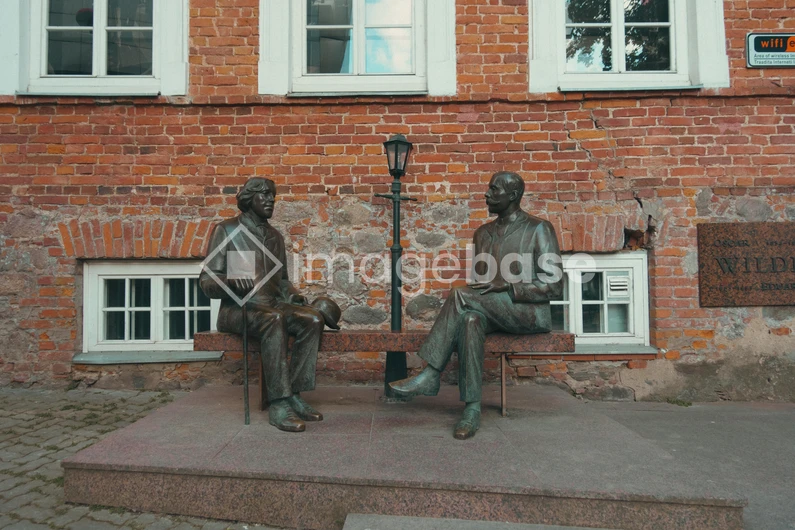 Historical Brick Facade with Sculpture