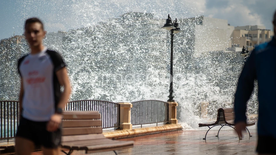 Coastal Walkway with Splashing Waves