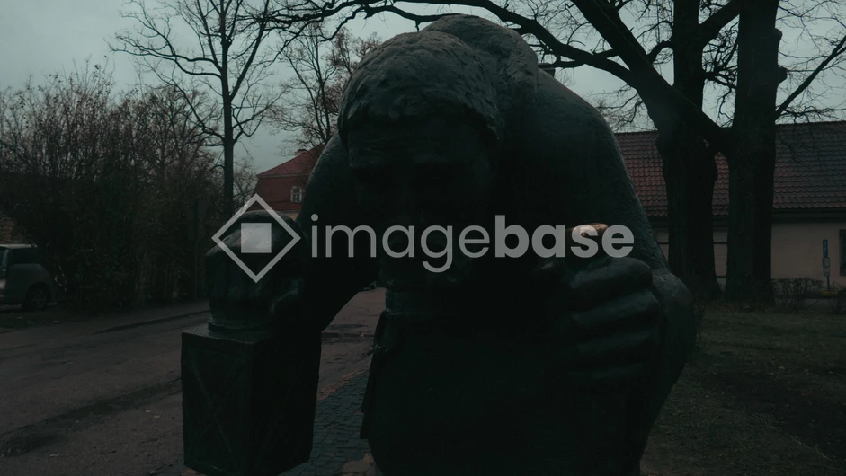 Dark Sculpture in Urban Setting