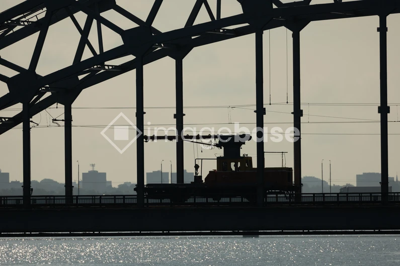 Industrial Silhouette on Bridge