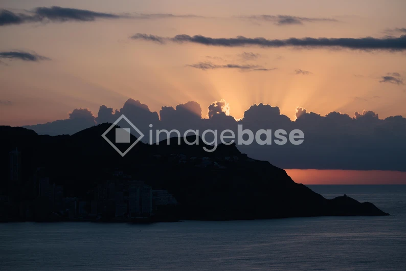 Sunset Over Mountain Silhouette