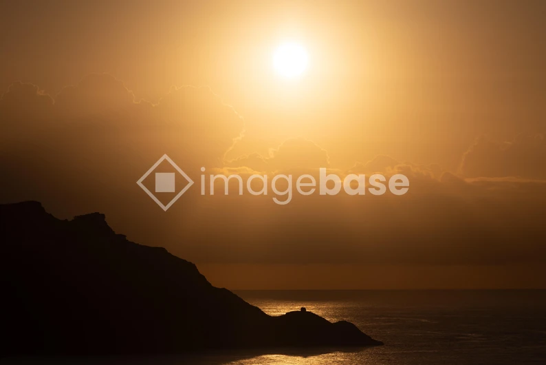 Sunset Over Cliff