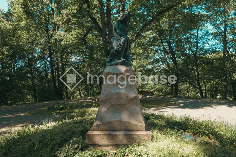 Statue in a Sunlit Park