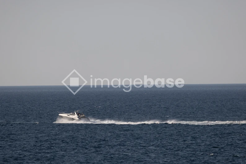 Speeding Boat on Open Sea