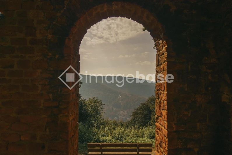 Scenic View Through Stone Archway