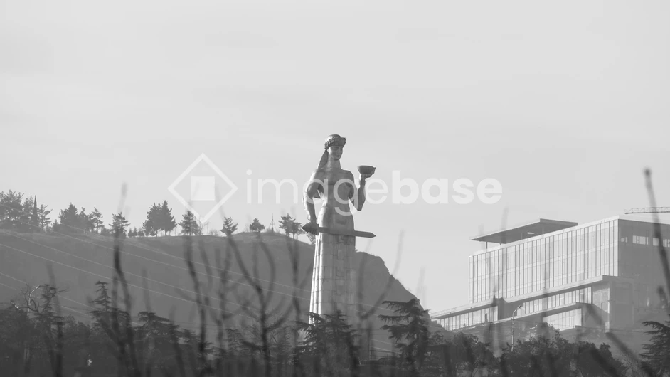 Monument in Foggy Landscape