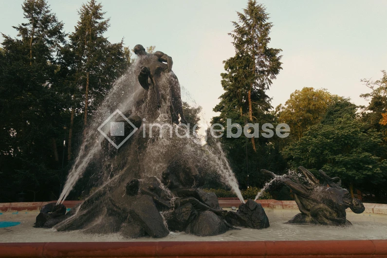 Majestic Fountain in Forested Park