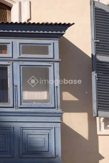 Rustic Blue Shutters and Window