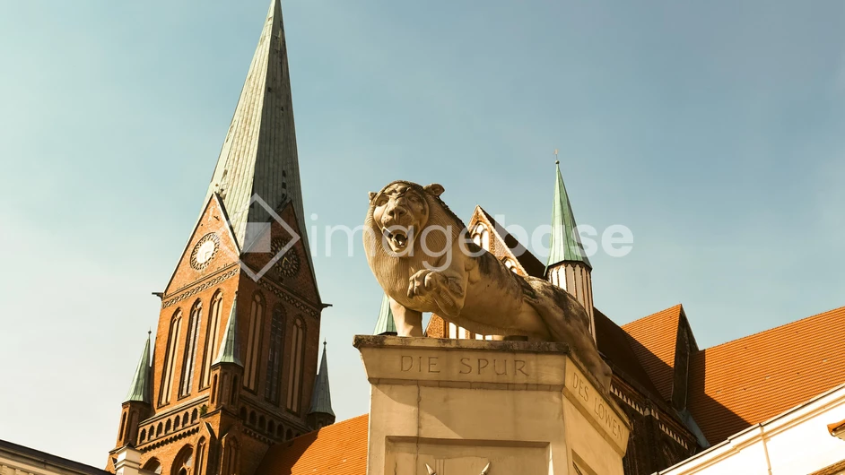 Historic City Architecture with Lion Sculpture