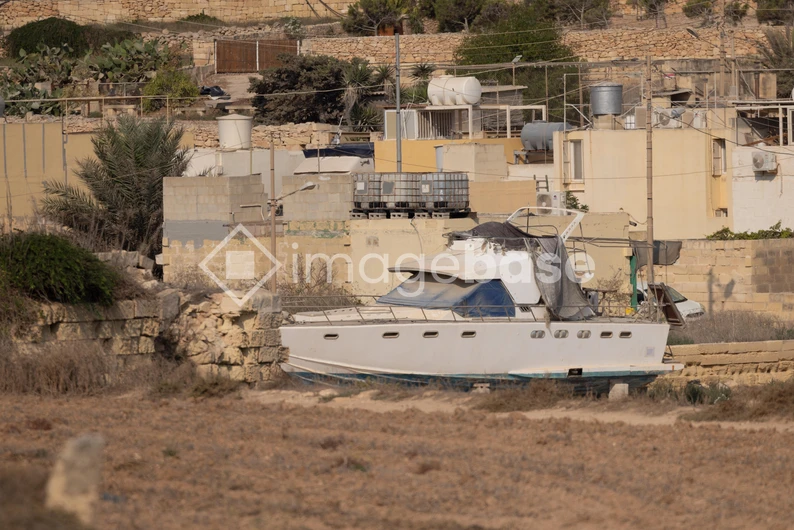 Coastal Urban Scene with Docked Boat