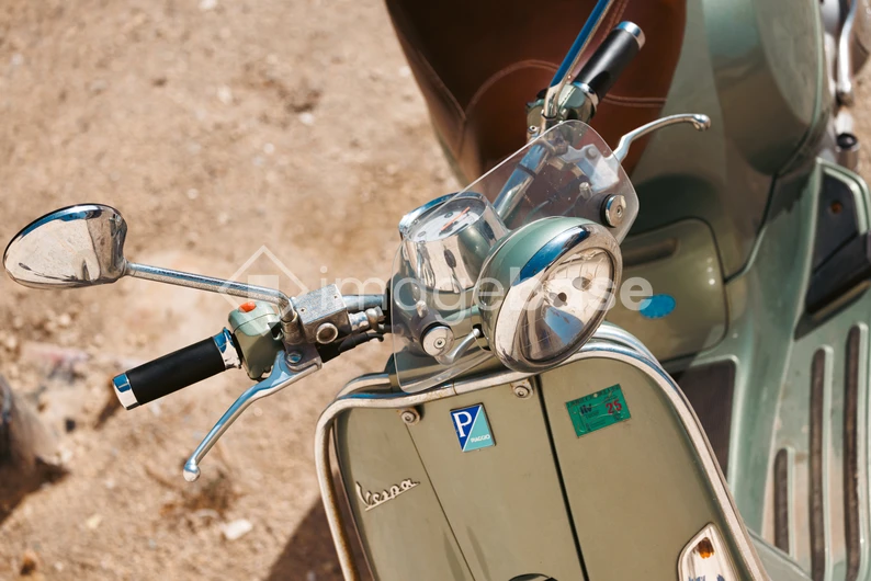 Classic Scooter on Sandy Background