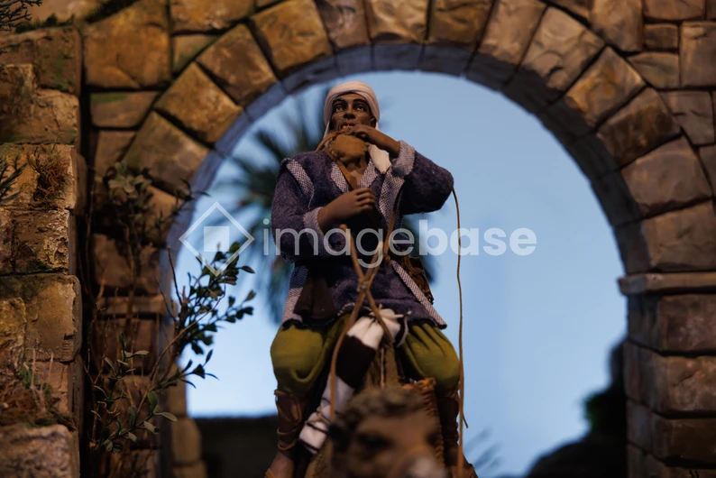 Figurine Under Stone Arch