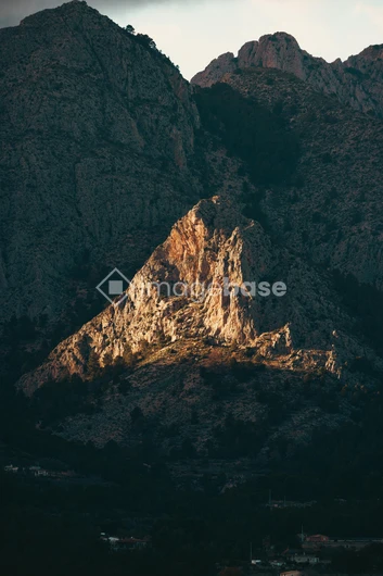 Sunlit Mountain Peak