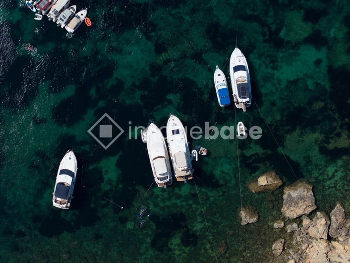 Aerial View of Boats on Clear Waters