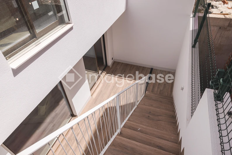 Modern Staircase in Sunlit Interior