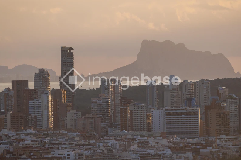 Cityscape with Mountain Backdrop