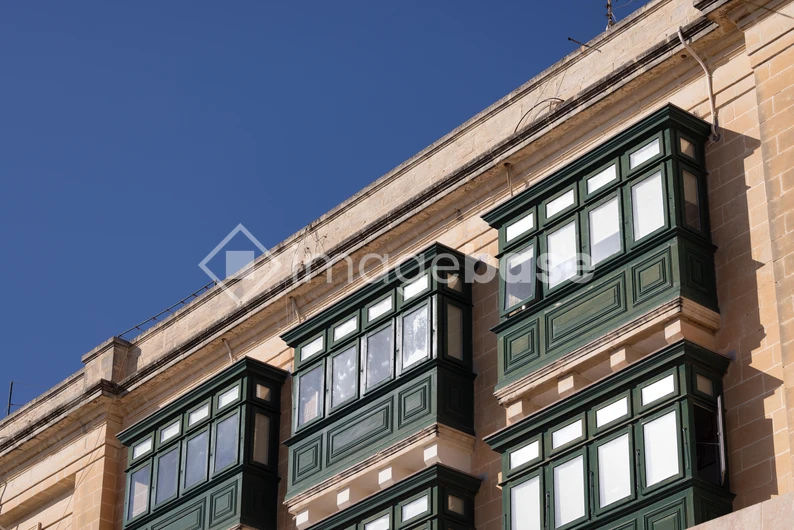 Traditional Architecture with Green Balconies