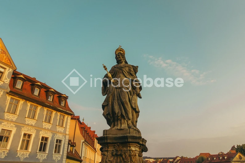 Ancient Sculpture in Cityscape