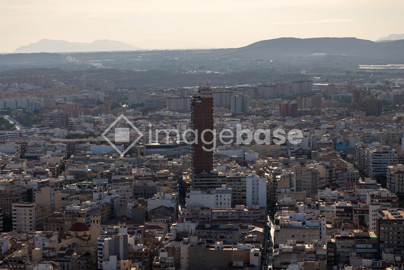 Cityscape with Mountain Backdrop