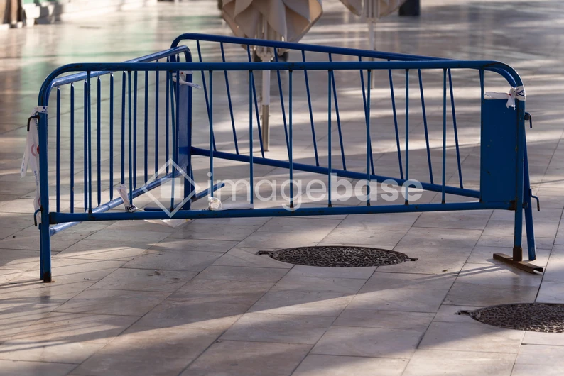 Blue Barricade on Pavement