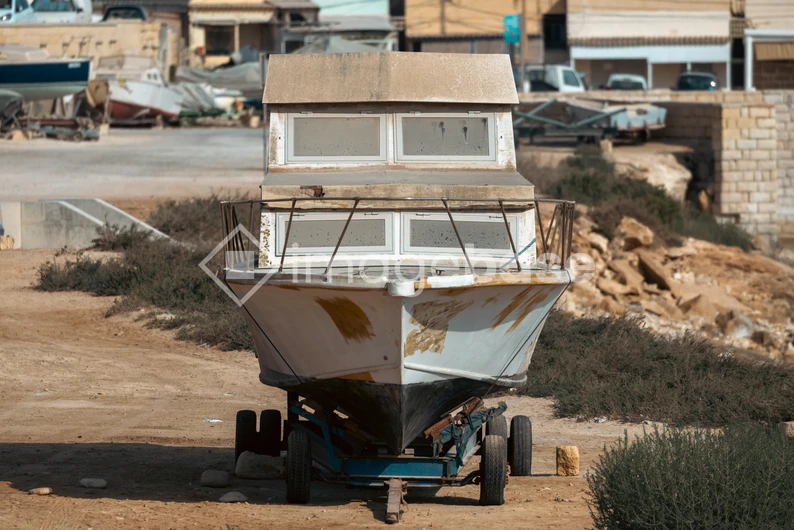 Docked Boat on Dry Land