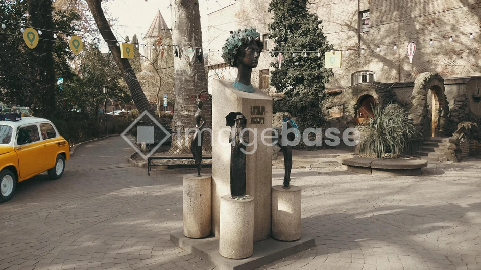 Bust in a Quaint Courtyard