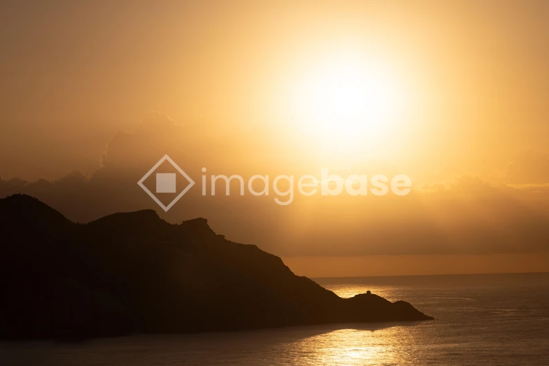 Sunset Over Mountain Range