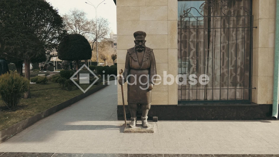 Statue by a Building