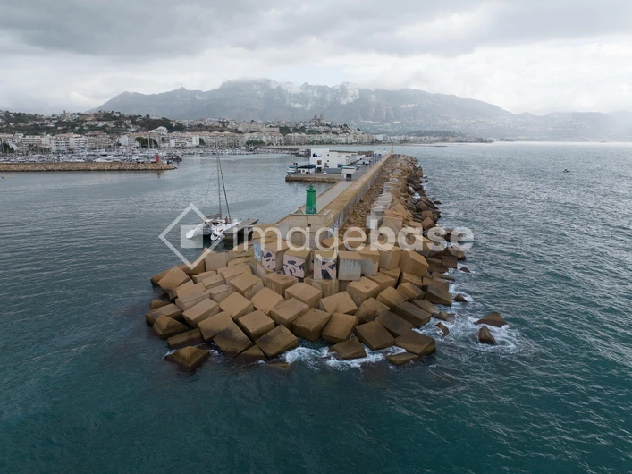 Harbor Jetty with Mountains