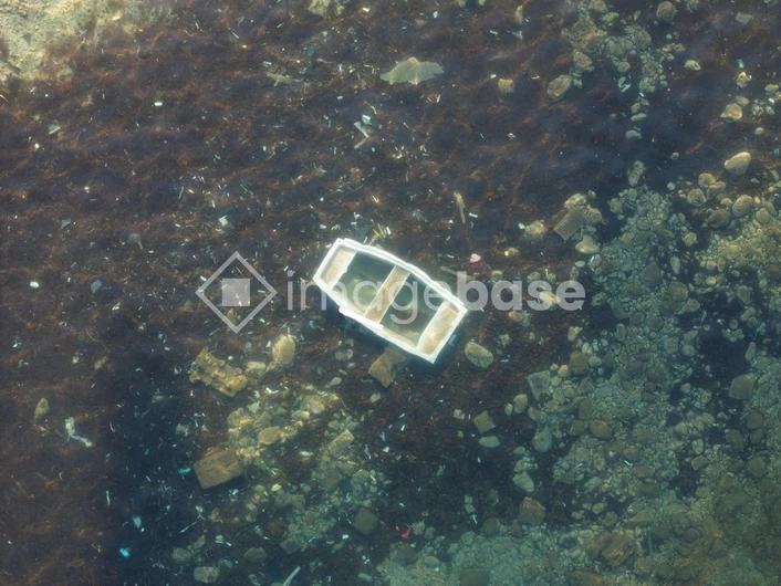 Submerged Boat in Clear Waters