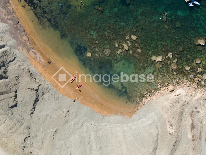 Aerial View of Beach and Kayaks