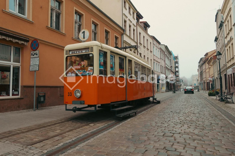 Vintage Streetcar on Cobblestone Street