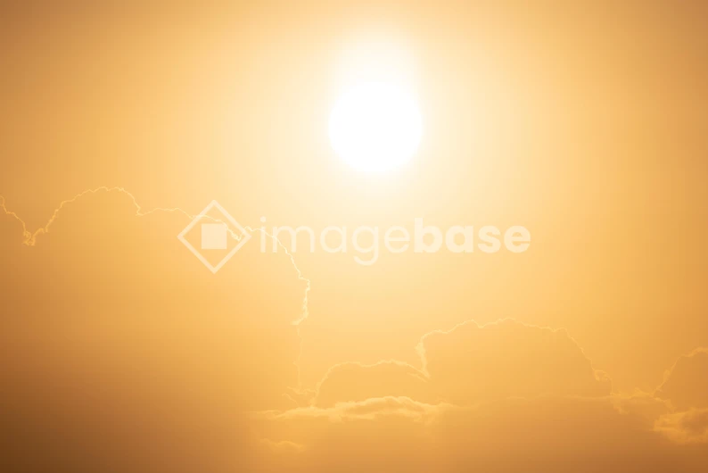 Golden Sunset Over Clouds