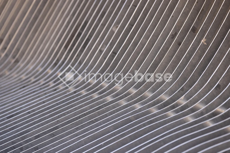Curved Lines on Grey Surface