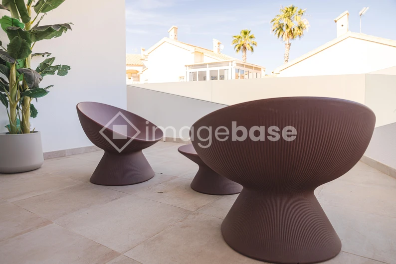 Modern Patio with Stylish Chairs