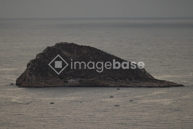 Solitary Island in Calm Seas